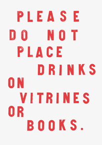 Please do not place drinks on vitrines or books